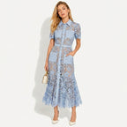 Dam midiklänning med korta ärmar och blommigt mönster samt knäppning och skärp och fyra fickor-Midi Dress-Fjallbarn