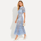Dam midiklänning med korta ärmar och blommigt mönster samt knäppning och skärp och fyra fickor-Midi Dress-Fjallbarn