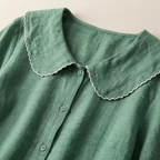 Damblus med knappstängning och rundad krage-Blouse for women-Fjallbarn
