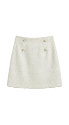 Damkjol i texturerat material med hög midja och knappar-Skirt for women-Fjallbarn
