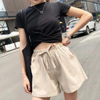 Damshorts med hög midja, dragsko och texturerad yta-Shorts for women-Fjallbarn