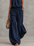 Halterneck-jumpsuit för dam med smockad midja-Jumpsuits for woman-Fjallbarn