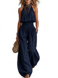 Halterneck-jumpsuit för dam med smockad midja-Jumpsuits for woman-Fjallbarn