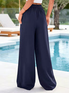 Högmidjade vida byxor med veck för dam-Pants for Women-Fjallbarn