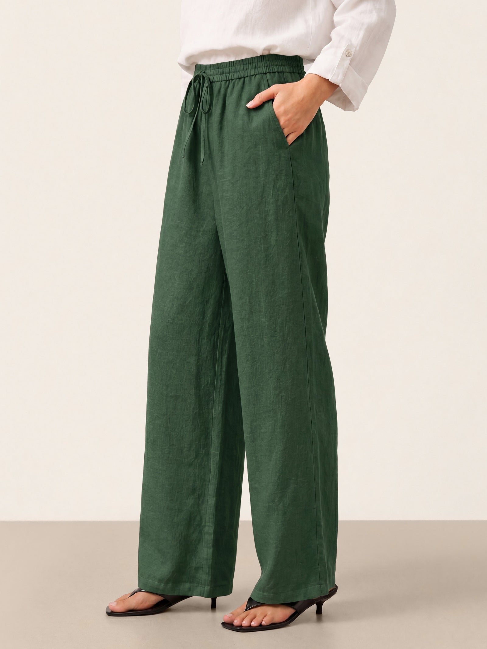 Linnebyxor med vida ben och dragsko för dam-Pants for Women-Fjallbarn