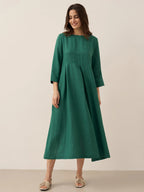 Plisserad midiklänning i linne med båthals för dam-Midi Dress-Fjallbarn