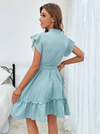Prickig miniklänning med volanger för dam-Mini Dress-Fjallbarn