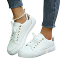 Quiltade sneakers med låg profil för dam-Footwear for women-Fjallbarn