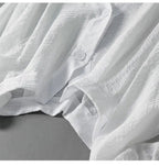 V-ringad texturerad blus med knappar för dam-Blouses for women-Fjallbarn
