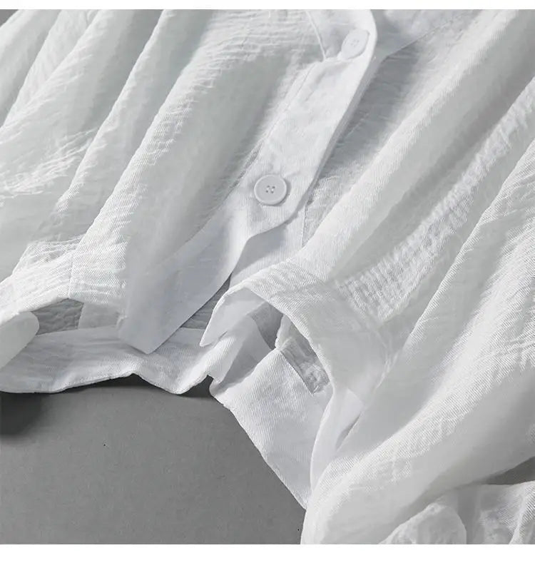 V-ringad texturerad blus med knappar för dam-Blouses for women-Fjallbarn
