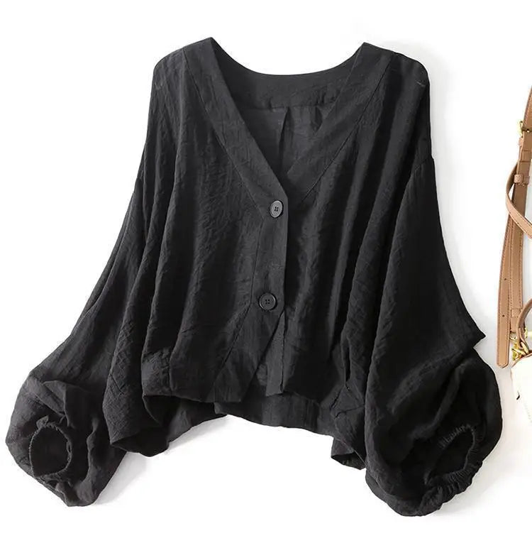 V-ringad texturerad blus med knappar för dam-Blouses for women-Fjallbarn