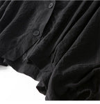 V-ringad texturerad blus med knappar för dam-Blouses for women-Fjallbarn