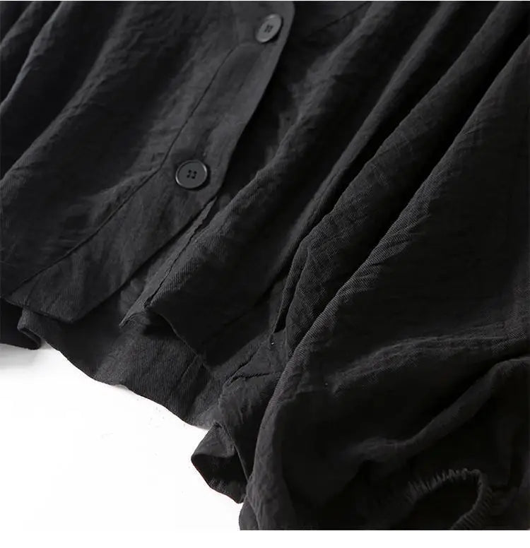V-ringad texturerad blus med knappar för dam-Blouses for women-Fjallbarn