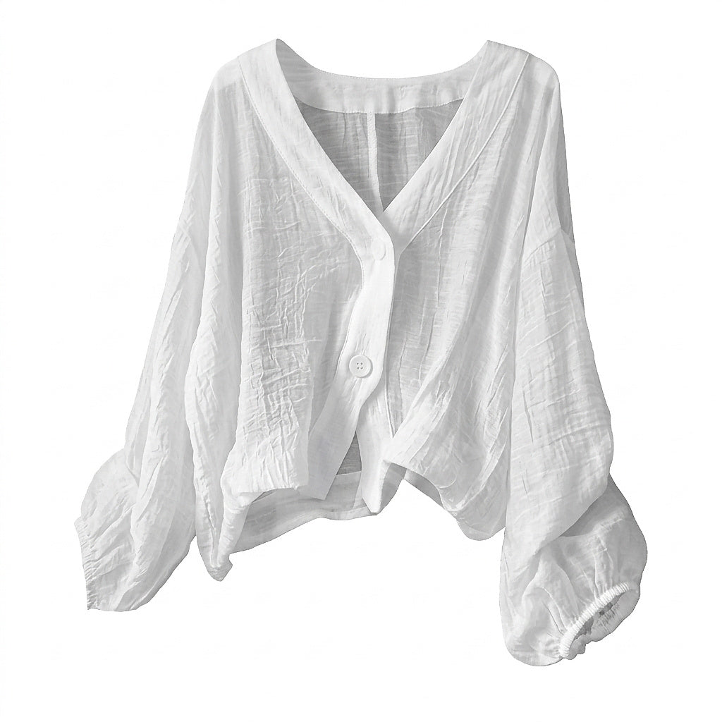 V-ringad texturerad blus med knappar för dam-Blouses for women-Fjallbarn